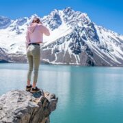 Woman standing in front of the mountains in Chile